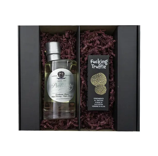 Geschenkset No. 21. Enthalten sind eine Flasche weißer Prelibato-Balsamicoessig und ein Fläschchen Trüffelöl "Fucking Truffle". Beide Produkte sind in einer eleganten Box arrangiert und bieten eine exquisite Kombination für Feinschmecker und Liebhaber edler Trüffel- und Essigspezialitäten.